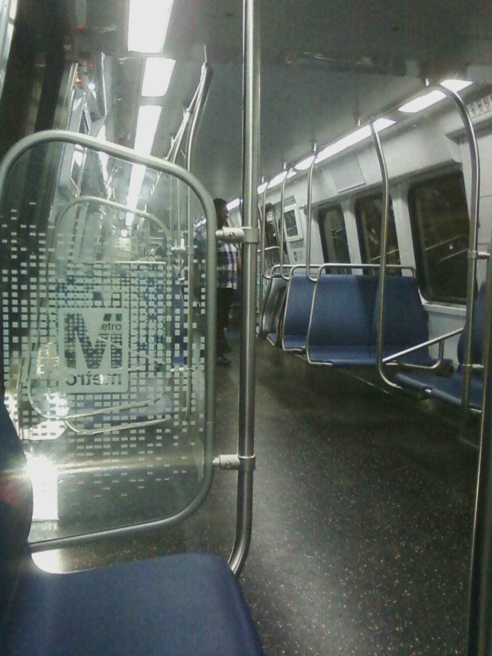 WMATA/DC Metro 7000 series car interior, again noting the 
industrial, pallid interior lighting, the minimalist seating, the lack of 
carpeting, and the overall feel that the car is designed to be easily and 
cheaply cleaned without any regard for passenger comfort.  For  
further details, please visit www.wirelessnotes.org.